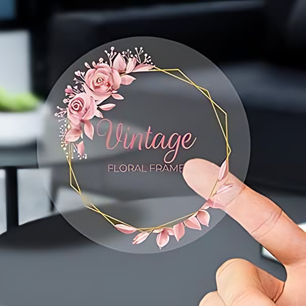 Etiqueta circular transparente con marco floral